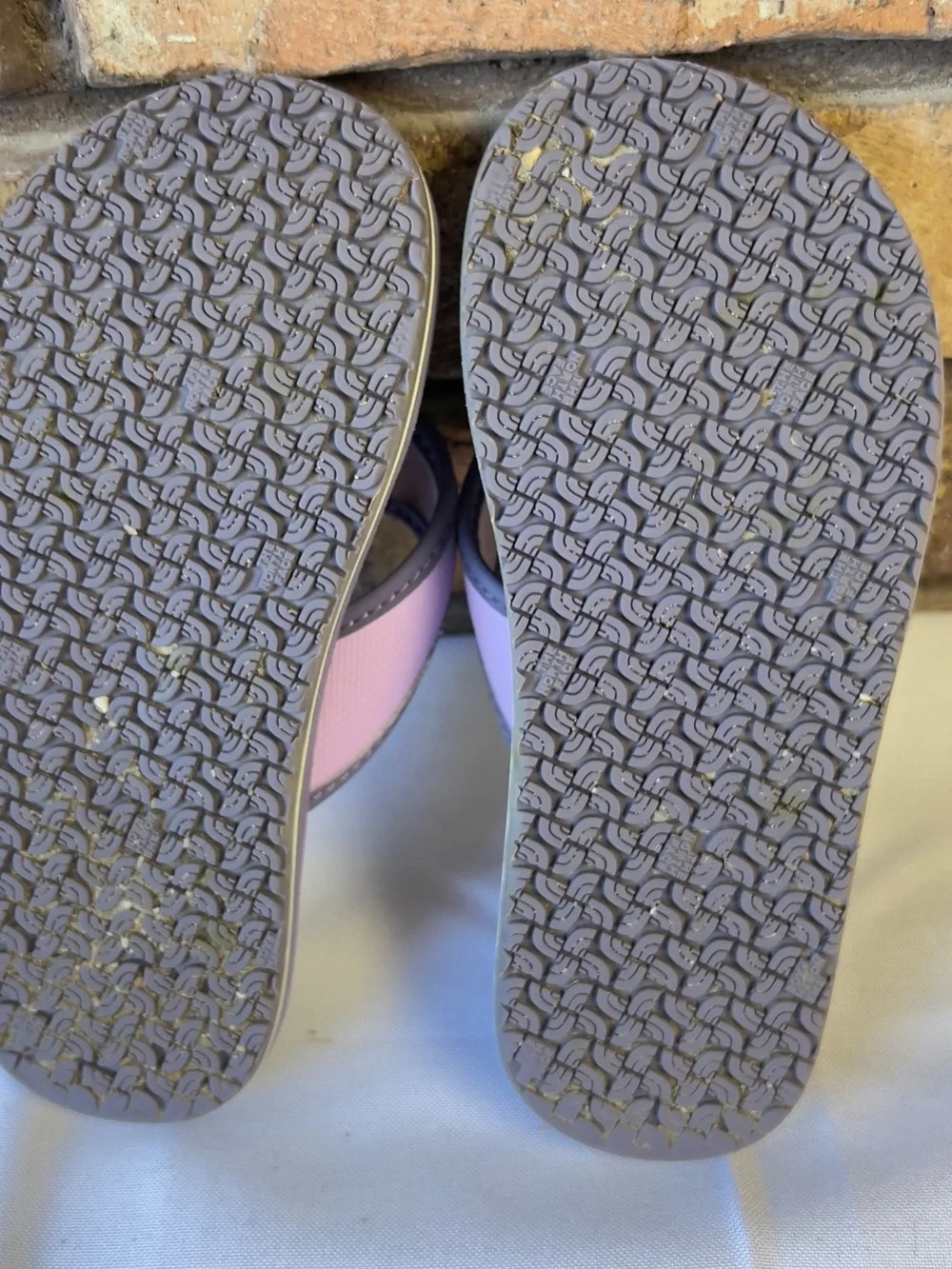 The North Face Kids Lavender and Gray Flip Flop Sandals
